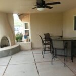 Sierra Remodeling adobe style outdoor patio with kiva fireplace