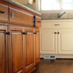 A run of custom alder kitchen cabinets and painted cabinets